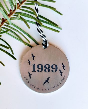 1989 Ornament - Seaguls flying around the number 1989 with the words "let's get out of this town"