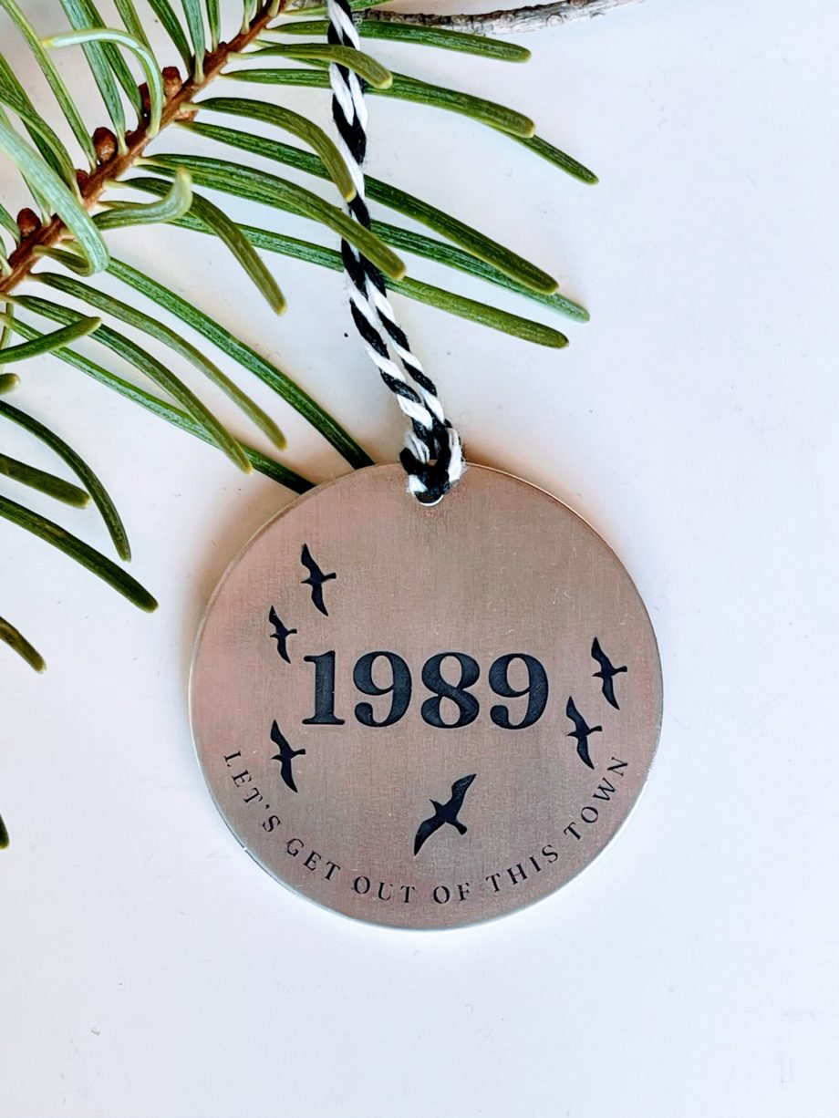 1989 Ornament - Seaguls flying around the number 1989 with the words "let's get out of this town"
